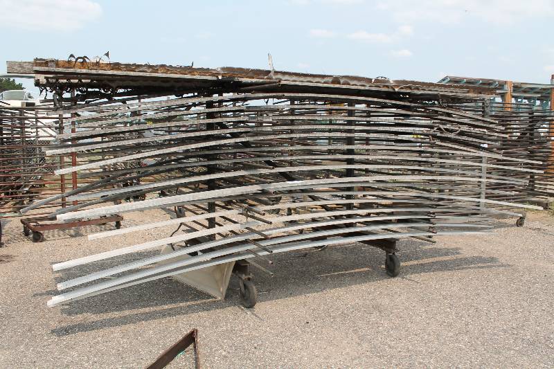 lot 116 image: Large Metal Racking Units wWheels Pole Shelves On Both Sides For SidingTubing Storage 94 x 80 x 90.
