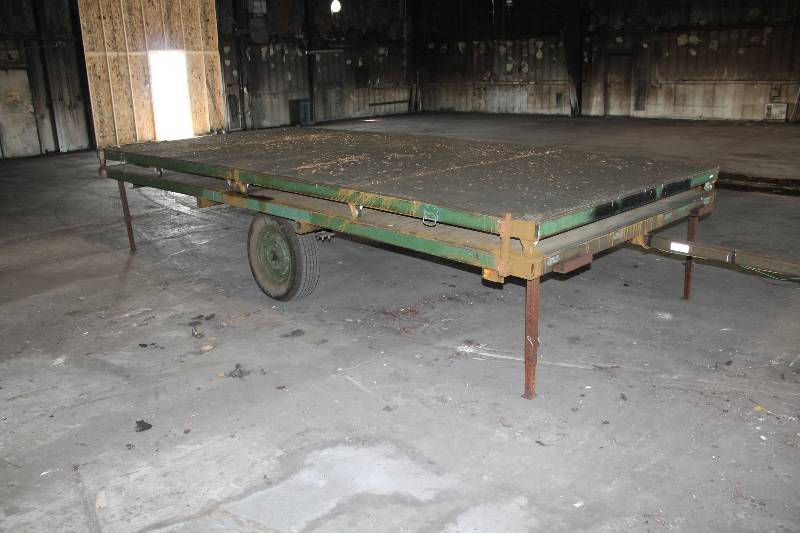lot 99 image: Flat Bed Style Trailer wWheels & Hitch Collapsible Trailer Opens To Double Length Closed Dimensions 90 x 192 x 39 Open 90 x 384 x 39 Includes New Wiring Harness.