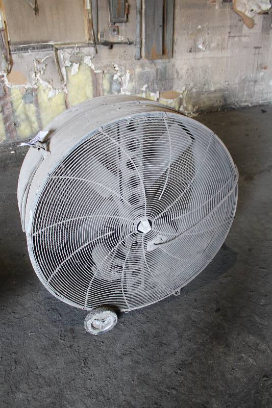 lot 157 image: Commercial Fan Unit wHousing & Cord Circular Protective Grate Wheels Metal 56 x 36 x 58.