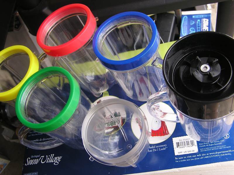 lot 36 image: MAGIC BULLET OR NINJA BLENDER JARS