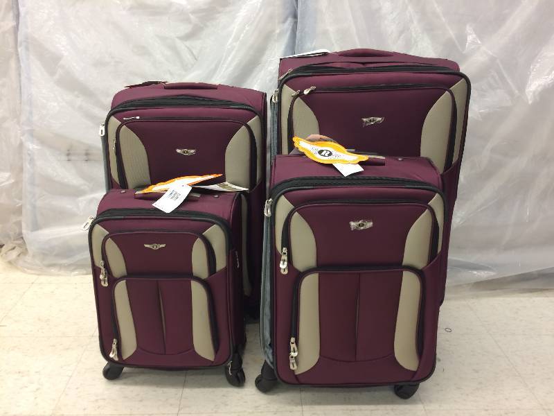 lot 56 image: Rockland Luggage Impact Spinner Four-Piece Luggage Set