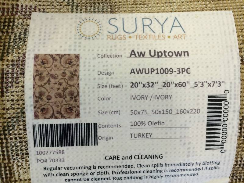 lot 106 image: surya 3 piece ivory rug set
