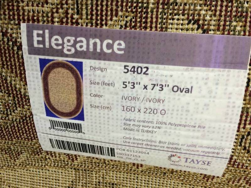 lot 115 image: elegance floor rug ivory 160x 220 o