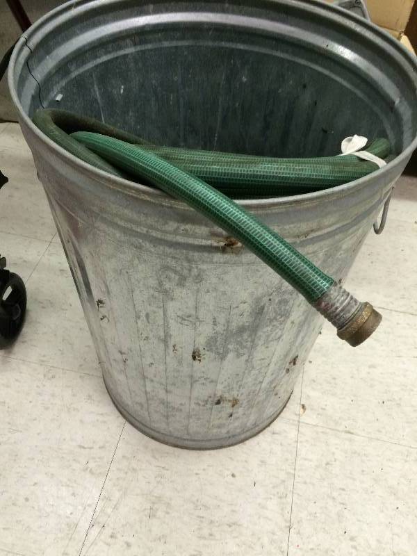 lot 225 image: 2 hoses and a garbage can