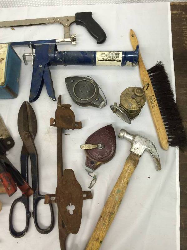 lot 243 image: snips glasses hammer saw chalk lines and more