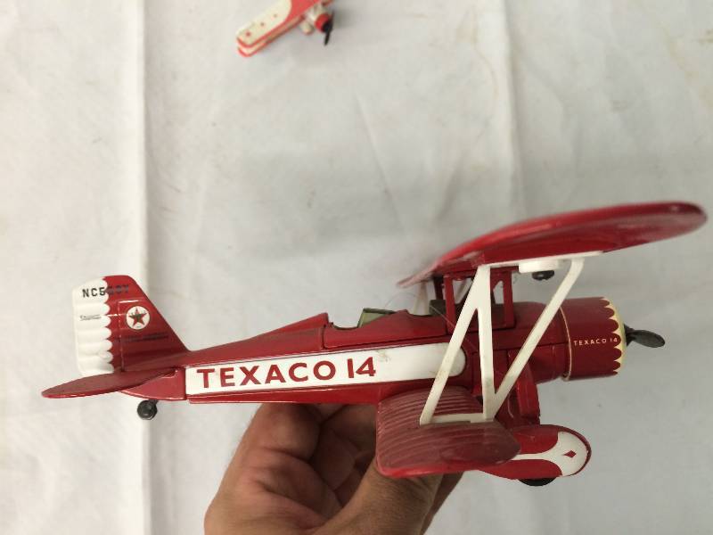 lot 245 image: texaco 14 metal piggy bank with another airplane