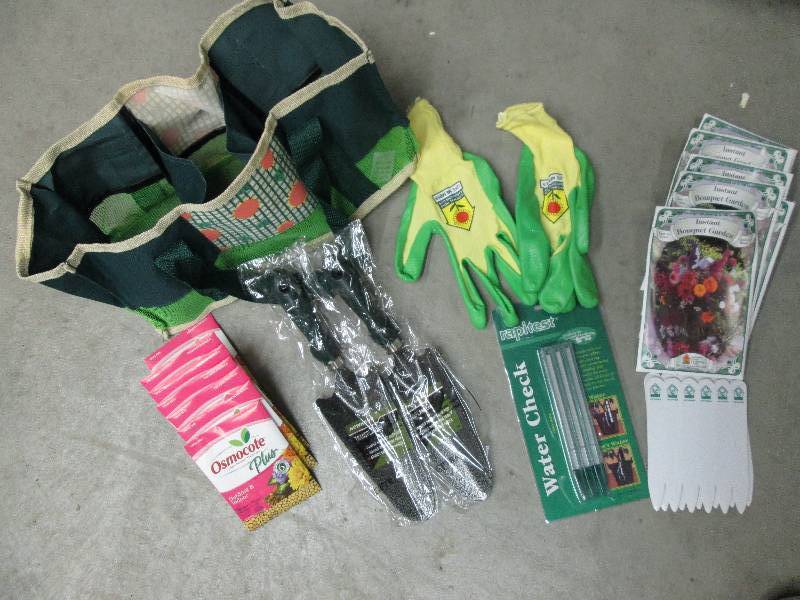 tote with seeds gloves 2 shovels pl...