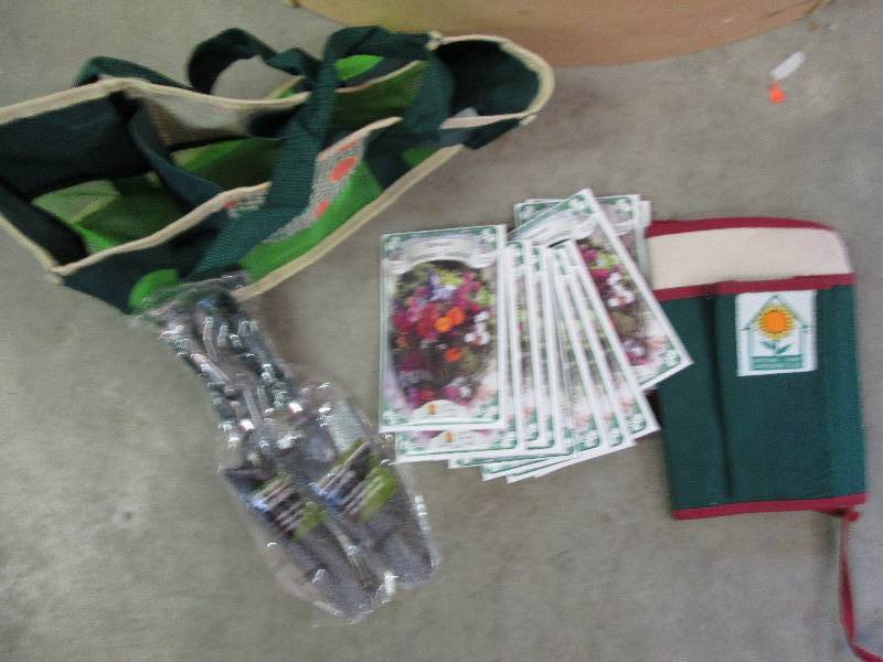 tote 2 shovels seeds and tie waist ...