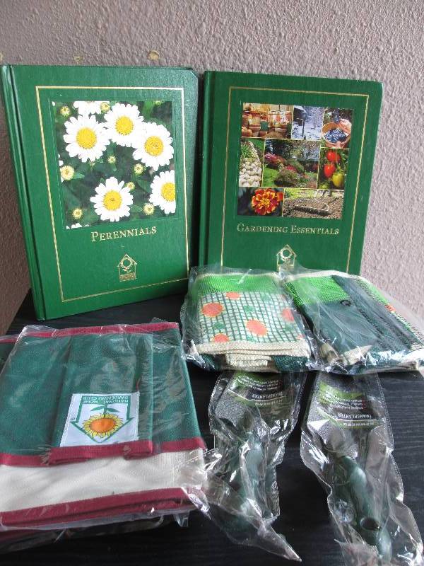 2 gardning books 2 shovels 2 tie on...