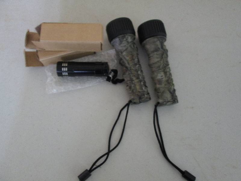 2 small flashlights and 2camo hunti...