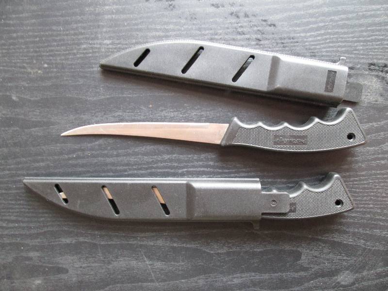 2 pro flex angler knives with cover...