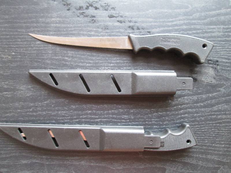 2 pro flex angler knives with cover...