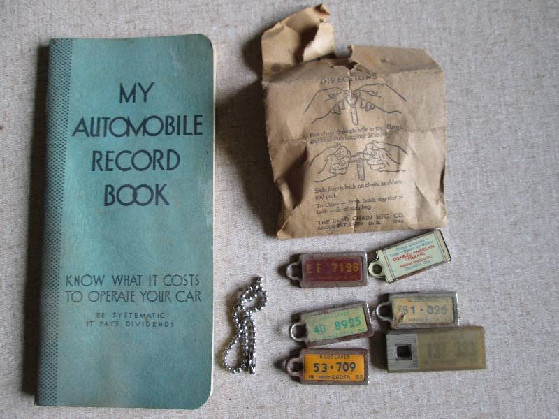 lot 13 image: Miniature vintage license plates, a...