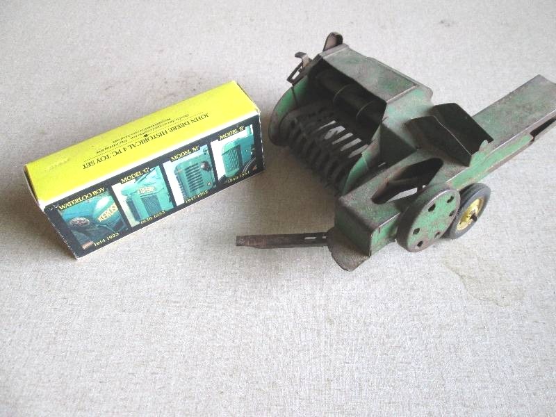 lot 46 image: John Deere metal replica farm imple...