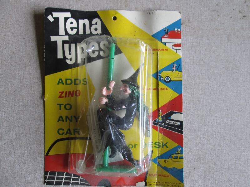 lot 52 image: Vintage witch car or desk topper...