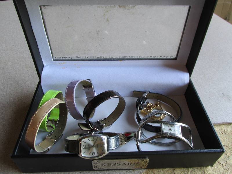 lot 138 image: Lot of bands and watches in a case...