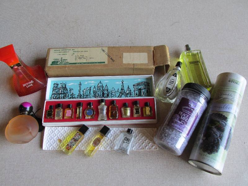 lot 141 image: Lot of perfume and a perfume sample...