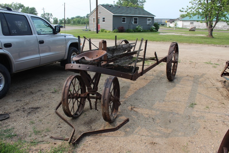 lot 2 image: Antique Horse Drawn Manure Spreader Frame  TAXI CAB