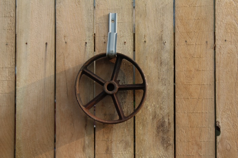 lot 34 image: Antique Pulley Wheel