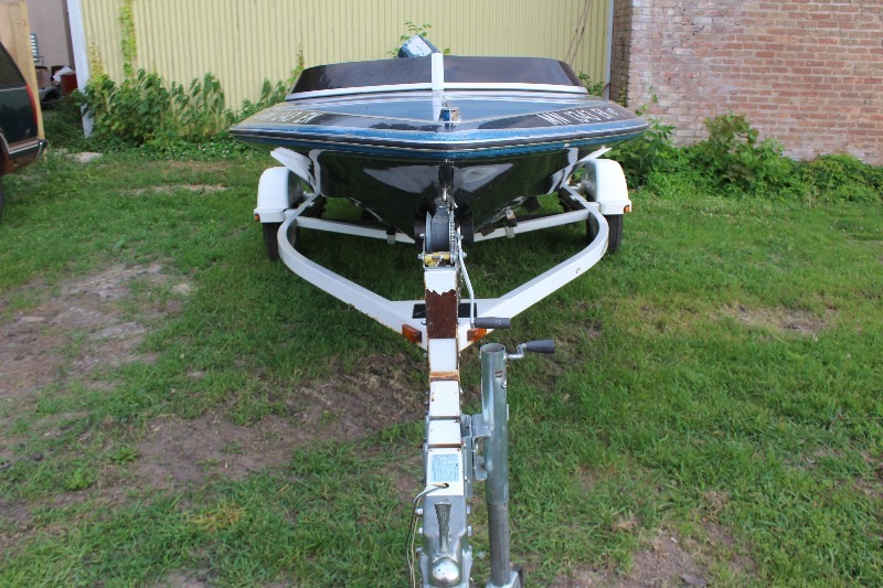 1981 Baja Fiberglass Boat, 75HP Evinrude Outboard, 2001 Spartan Boat Trailer