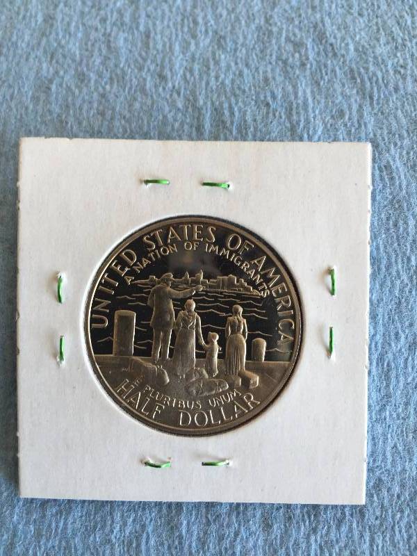 1986-D STATUE OF LIBERTY CENTENNIAL CLAD HALF DOLLAR