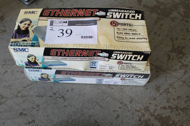 lot 39 image: Box Lot of (2) Ethernet Managed Switch SMC Brand 5 Ports 10100Mbps.