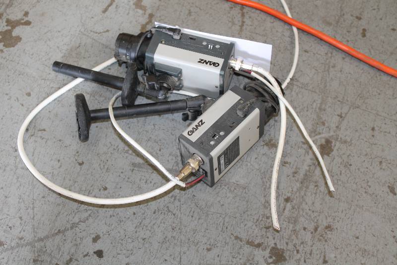 lot 76 image: Lot of (2) Ganz Color Security Cameras wHardware Mounts Model YC02C.