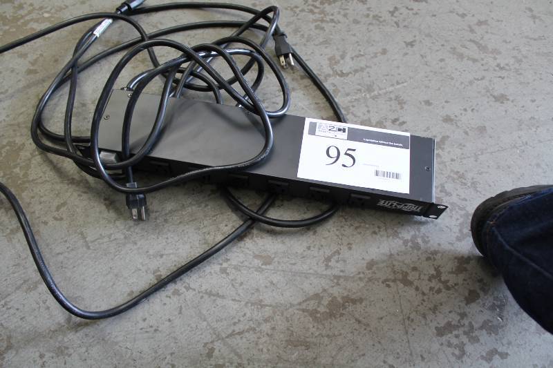 lot 95 image: Tripp-Lite Surge Protector Model RS-1215-RA.
