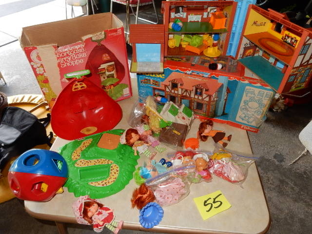 lot 55 image: Strawberry Shortcake and Fisher Price Family HOUSE.