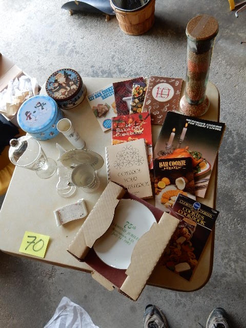 lot 70 image: Misc. Items Silver Anniversary glassware, Cook books, Bean Tower, 2 Xmas cans, Diamond Jubilee, Morristown South Dakota, 1983.. NEW IN BOX.