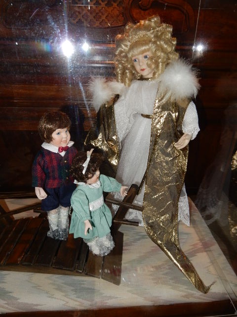 lot 25 image: Ashton Drake Doll (Angel) and 2 Children.. Plexiglass Display Case. Guardian Angel, 2 Children and Bridge.  All in the Plexiglass Case..
