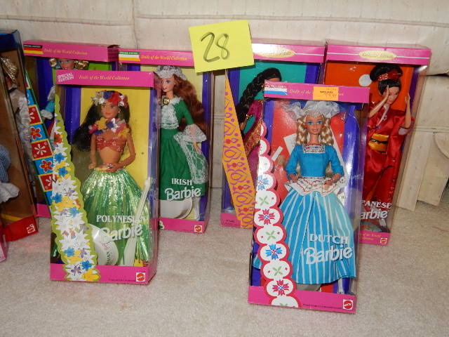 lot 28 image: 6 Dolls of the World Collection Barbies