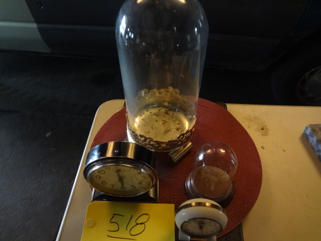 lot 518 image: Large Glass Bell, small one, two wind up clocks