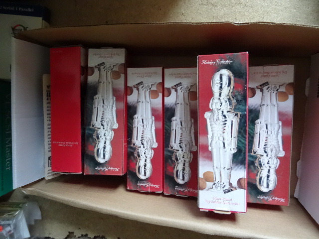 lot 23 image: 7 Silver Plated Toy Soldier Nutcrackers plus 3 lock de-icer