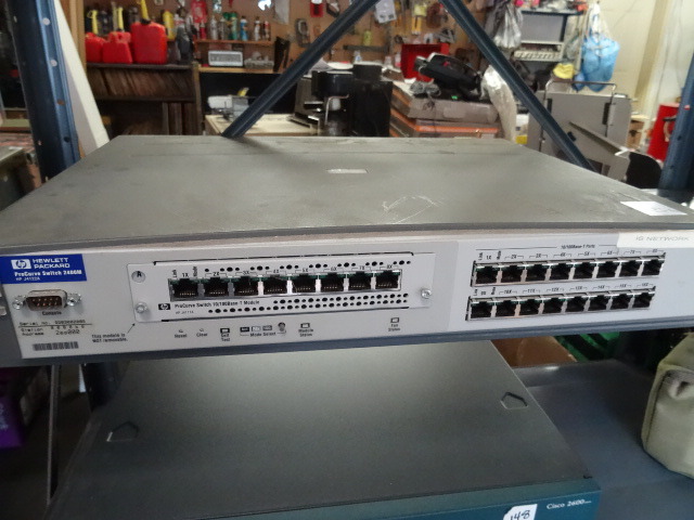 lot 154 image: HP Procurve 2400M 16-Port Switch with 8-Port 10100Base-T Module