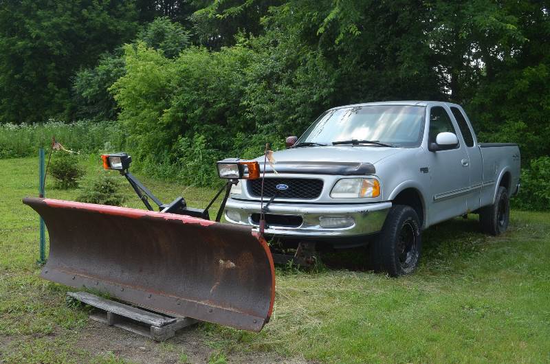Ford F150 XLT Truck with Plow