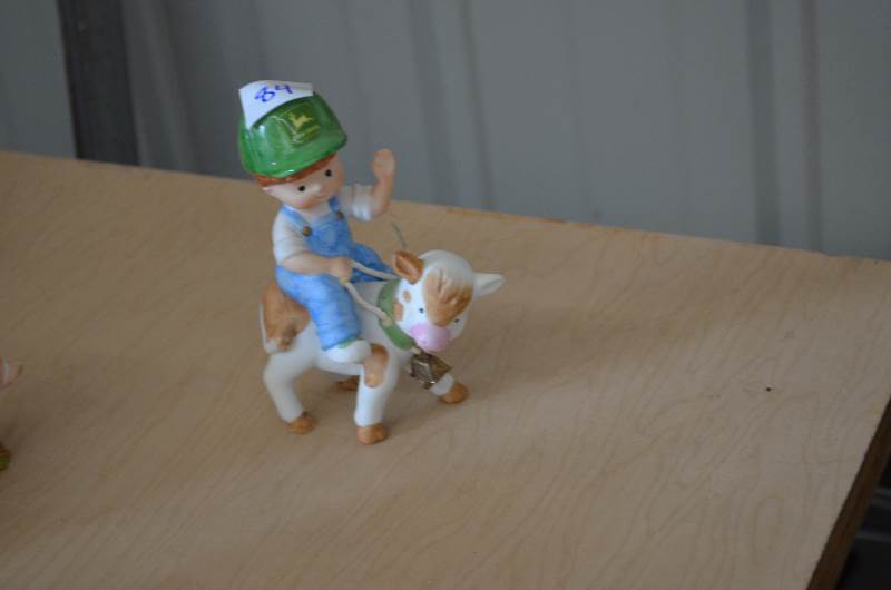 John Deere Boy on Cow
