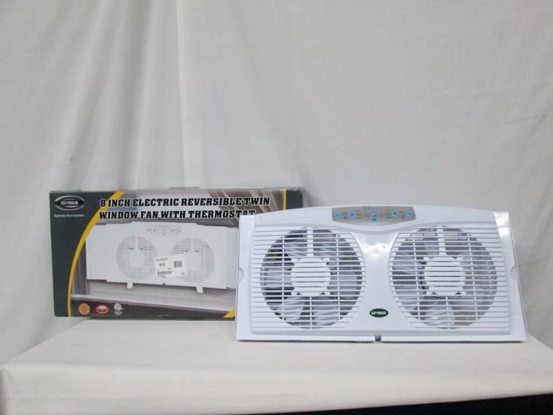 lot 47 image: Optimus Electrically Reversible Twin Window Fan