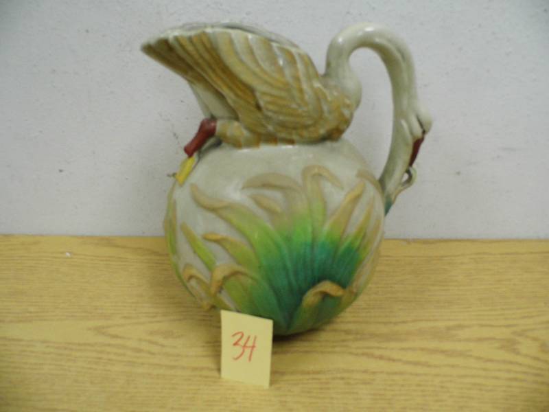 lot 34 image: Pitcher w Swan Handle