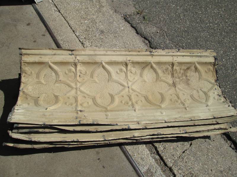 Strips of antique metal ceiling tin...