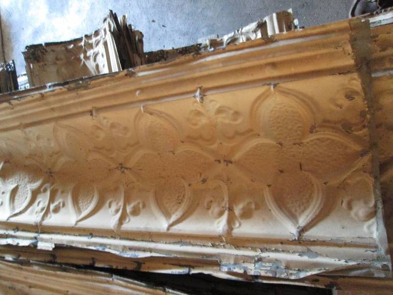 Strips of antique metal ceiling tin...