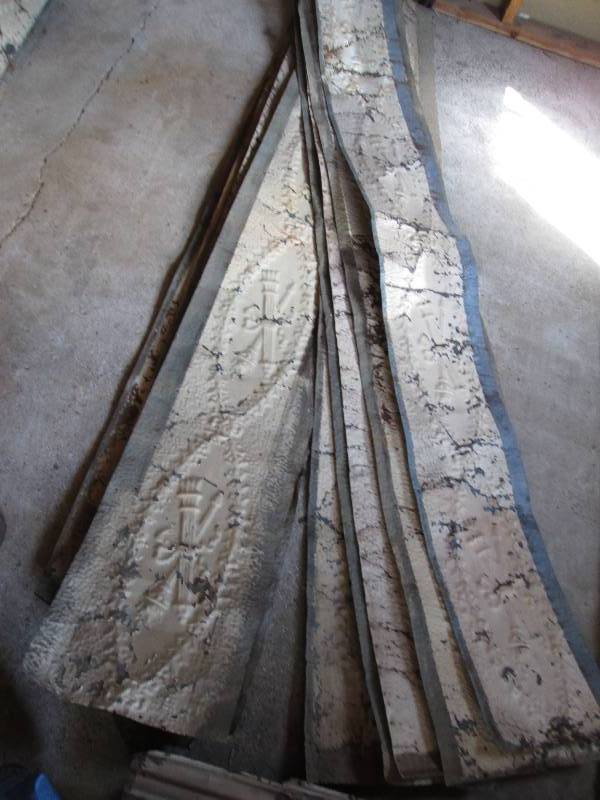 Strips of antique metal ceiling tin...