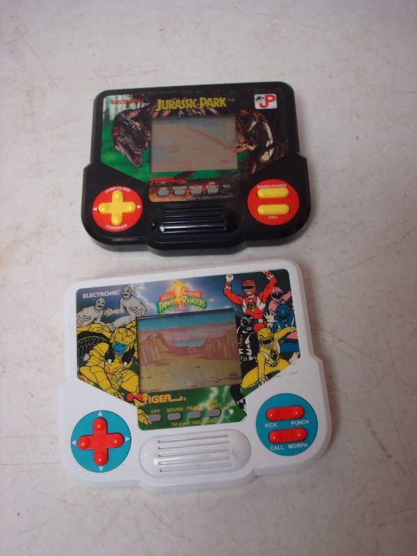 lot 57 image: Pair Of Vintage Hand Held Games