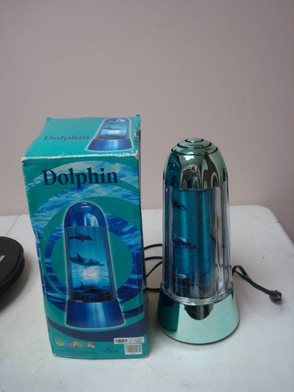 lot 120 image: Dolphin Spinning Light, Needs New Bulb