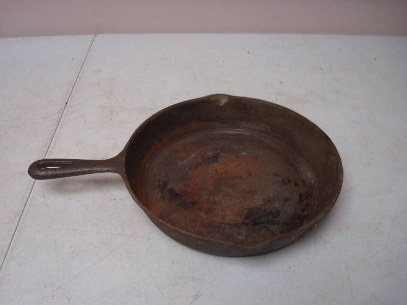 lot 128 image: Cast Iron Pan, Shows Wear