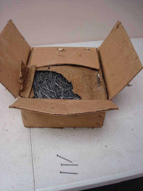 lot 134 image: Box Filled With Nails