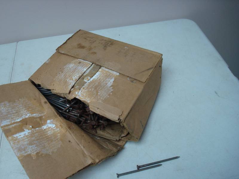 lot 151 image: Box Filled With Nails