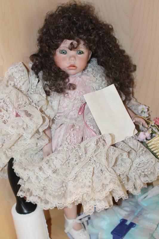lot 25 image: Grandmas Doll w Brown Hair & Dress By Norma Kunz Limited Edition Reproduction Doll SignedSerial Numbered & Dated 20 Height.