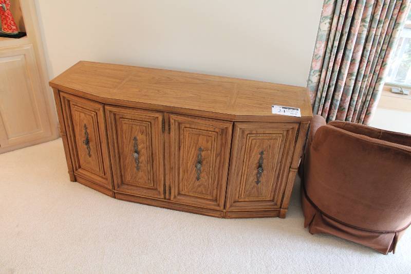 lot 24 image: Lot of (2) Including Wooden Dresser Cabinet wDrawers & Handles Sofa Chair wRed Upholstery & Arm Rests 29 x 31 x 31, 56 x 18 x 28.