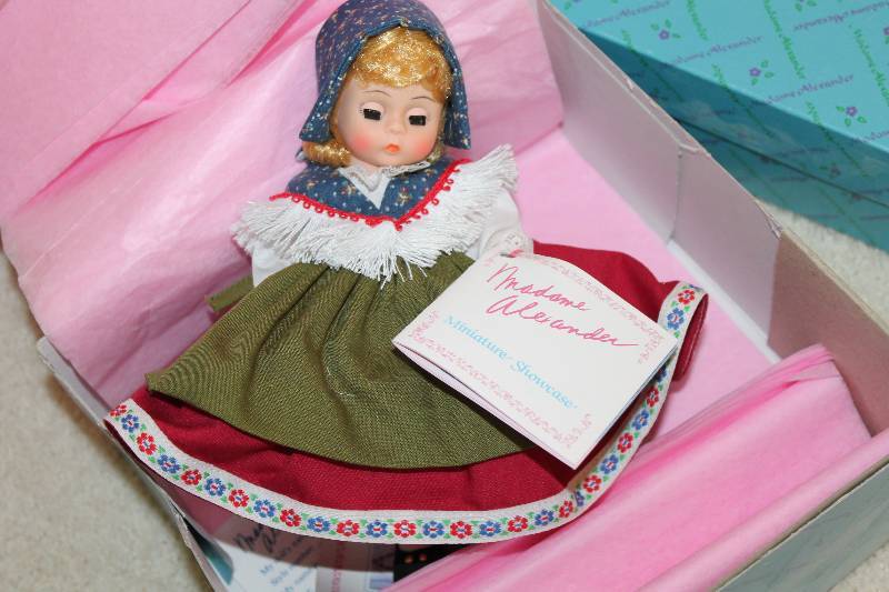 lot 33 image: Madame Alexander Doll In Original Packaging wOriginal Collector Registration No. 077511.